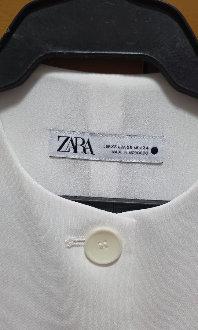 Zara White Crop Vest Size XS (Category: Sleeveless) located in Pasig City. Submitted by jannetteg (Listing ID 1466219237, Image 3). Description: - Brand: Zara - Size: US XS (Best fit: 34" bust, up to 30" waist) - Material: Corpo fabric with inner lining - Style: Semi-crop length, all buttons working properly - Condition: Excellent - Price: ₱750 (Orig. ₱1,990) - Promo: Bundle 3 items for ₱2,000 across same-priced items 📍Pasig 🤝Estancia on agreed