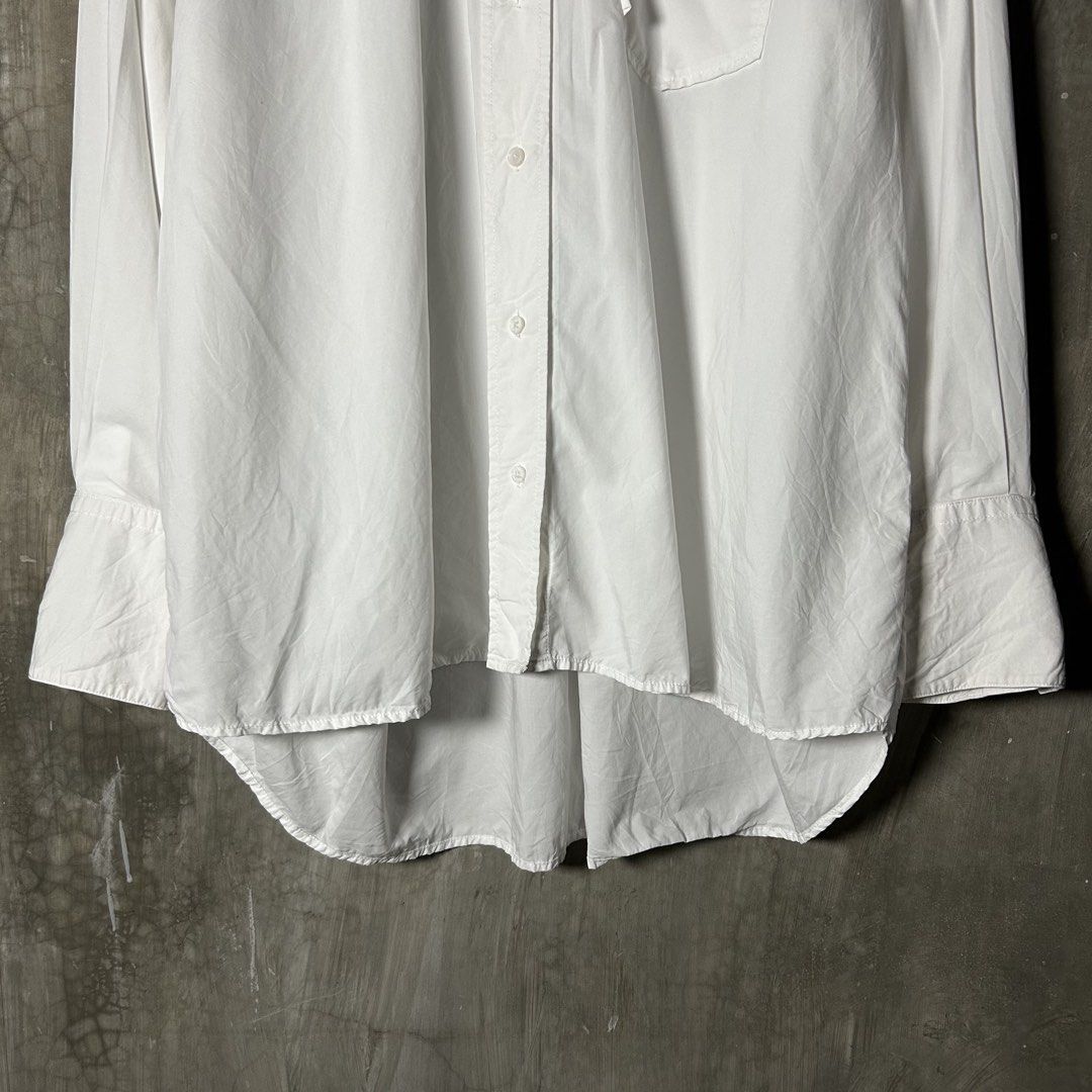 Zimmermann - White Button Down Longsleeve (Category: Formal Shirts) located in Tayabas. Submitted by streetdepartment (Listing ID 1466312559, Image 2). Description: Zimmermann - White Button Down Longsleeve Very good condition Flaw/s: pinhole Size: XL Measurements (inches): Width: 23.5” Length: 27 Front, 30 Back Hem: 28” Shoulder: 20” Sleeves: 22.5” Price: 3,580 + shipping fee Dm to purchase! Note: Manage your expectations as you are dealing with