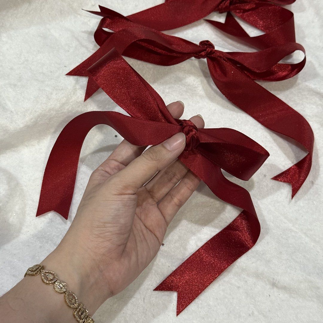 10pcs set bow ribbon bow Christmas Tree ornaments (Category: Other Home Decor) located in Marikina City. Submitted by lovegoeson (Listing ID 1466532269, Image 2). Description: - Includes 10 pieces of elegant dark red ribbon bows - Made from premium glossy satin fabric - Perfect size and shape for Christmas tree ornaments and holiday decor - Gives your tree an instant classy and festive upgrade - Hassle-free and ready to use for your holiday home 