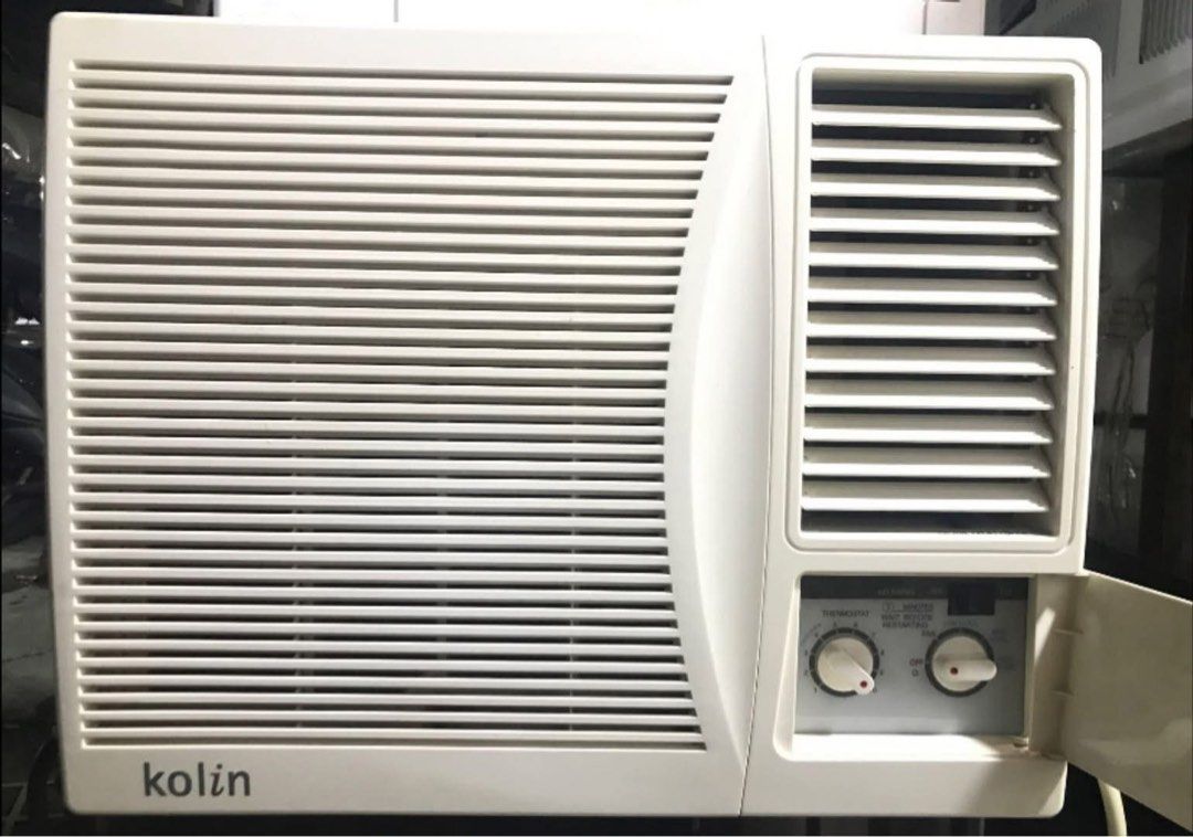1HP Kolin Window Type Air Conditioner (Category: Air Conditioning and Heating) located in Manila. Submitted by almira_03 (Listing ID 1466438425, Image 1). Description: - Brand/Type: White Kolin window-type air conditioner - Controls: Dual rotary knobs for thermostat and fan (neatly hidden behind a side door) - Airflow: Front panel with adjustable horizontal louver vents - Condition: Clean exterior housing, working great - Working smoothly and coo