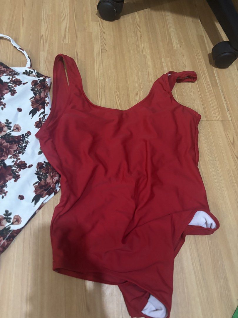5 swimsuit TAKE ALL! (Category: Bikinis & Swimsuits) located in Manila. Submitted by jobithings (Listing ID 1466443737, Image 3). Description: - 4-piece women's swimsuit bundle - White one-piece with red floral pattern and front keyhole cutout - Solid red scoop neck one-piece - Black zippered one-piece with a denim-look finish - Two-piece set featuring a ribbed pink top and matching tie-side bottoms - Clean, well-maintained, and ready to wear - P