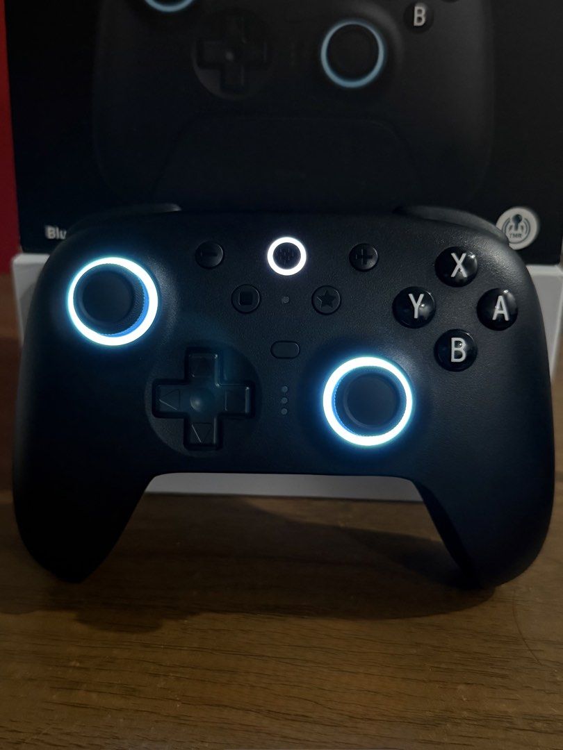 8BitDo Ultimate 2 Bluetooth Controller with Charging Dock (Category: Controllers) located in Cavite. Submitted by jy.dg (Listing ID 1466522210, Image 2). Description: Selling my Preloved 8BitDo Ultimate 2 Bluetooth Controller (Model 80ND) Slightly Nego. Used w/ care. Same quality as New & in Great condition. Rarely used (sa Hogwarts & Pokemon lang nagamit). - Color: Black - Condition: Fully functional and tested - Connectivity: Bluetooth, 2.4G wi