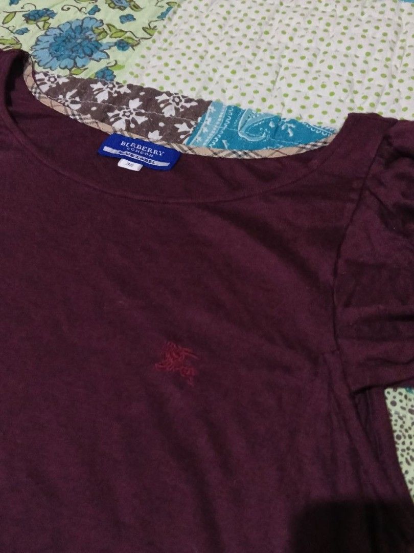 ✨ AUTHENTIC BURBERRY BLUE LABEL A-LINE TUNIC TOP ✨ (Category: Luxury Apparel) located in Adams. Submitted by red__lee (Listing ID 1466452239, Image 3). Description: A beautiful, authentic archive piece from the Japan-exclusive Burberry Blue Label line. Very rare cut with super flattering puffed cap sleeves and a subtle flared silhouette. • Condition: 10/10. Pristine condition, absolute zero flaws. No fading, no stains, no fabric piling, and no un