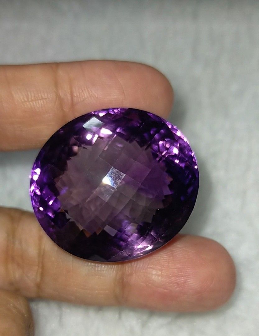💯 Natural AMETHYST loose (Category: Precious Stones) located in Kawit. Submitted by authentic_gemstones_byalton (Listing ID 1466486493, Image 1). Description: AVAILABLE ❗ COLLECTIBLE PIECE ❗ 💯 NATURAL URUGUAYAN AMETHYST LOOSE -109.6 carats -31.0x27.0x21.0 (mm) dimension -Oval checkerboard mixed faceted cut -VVS (clarity) -Unheated/untreated -W/ certificate of authenticity -7.0 (hardness) -100% brand new item -Uruguay (origin) #amethyst #Natural