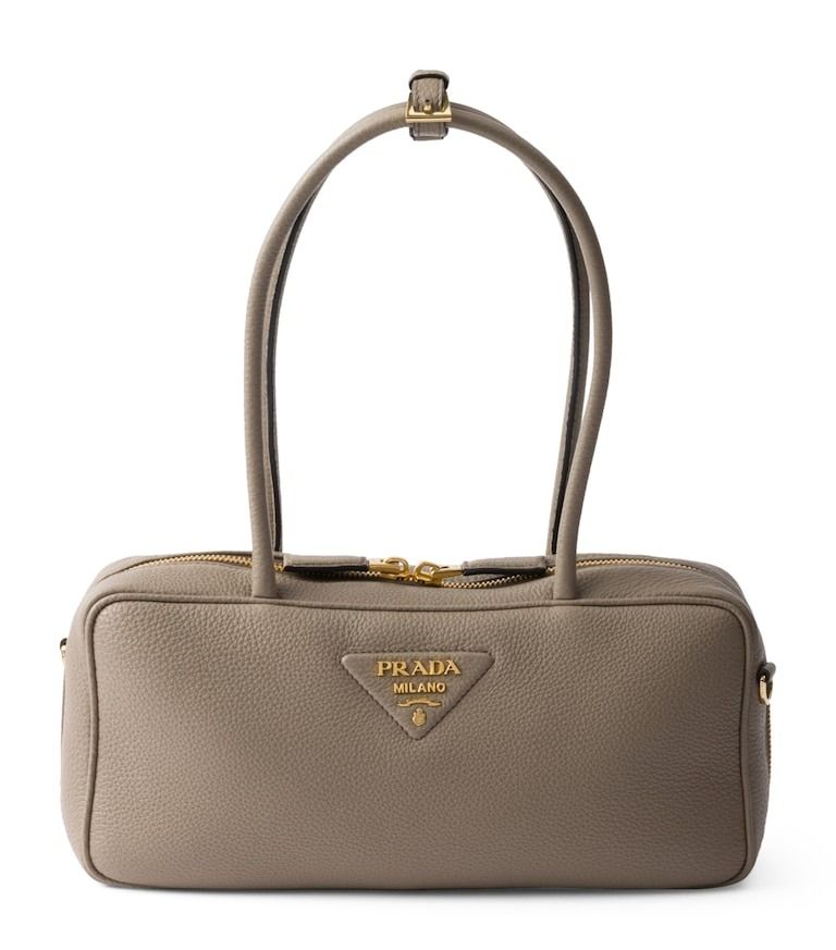 💜 Prada Daino Soft Leather Shoulder Bag Grey (Category: Luxury Bags & Wallets) located in Lala. Submitted by mohsin0825 (Listing ID 1466376270, Image 1). Description: Prada Daino Soft Leather Shoulder Bag Grey 17,990p plus sf Like new/ Brandnew Nappa leather lining 2-way zip Twin top handles Gold-tone hardware Interior zipped pocket Removable strap buckle H13cm x W28cm x D8cm approx. Made in Italy Presented with a Prada dust bag and box leather 