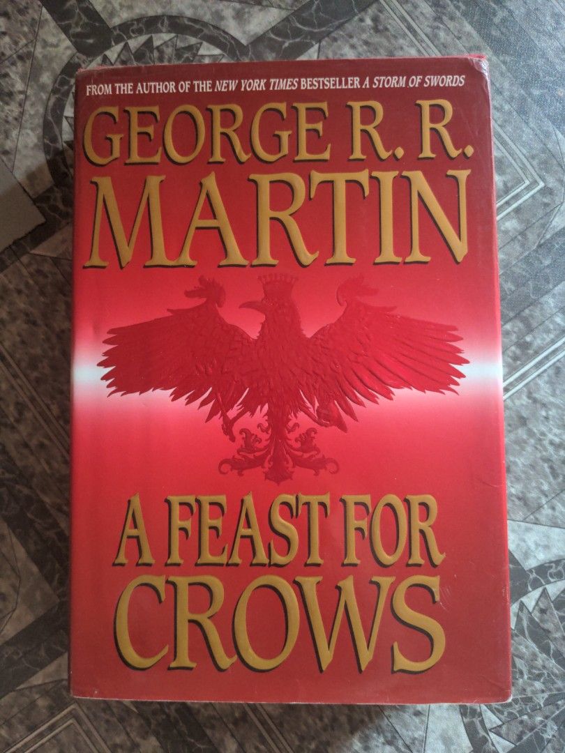 A Feast for Crows, George R.R. Martin (Category: Storybooks) located in Baguio. Submitted by fosterthe (Listing ID 1466366989, Image 1). Description: see photos for condition gcash/j&t price is firm a feast for crows george r.r. martin book 4 of a song of ice and fire hardcover good condition.