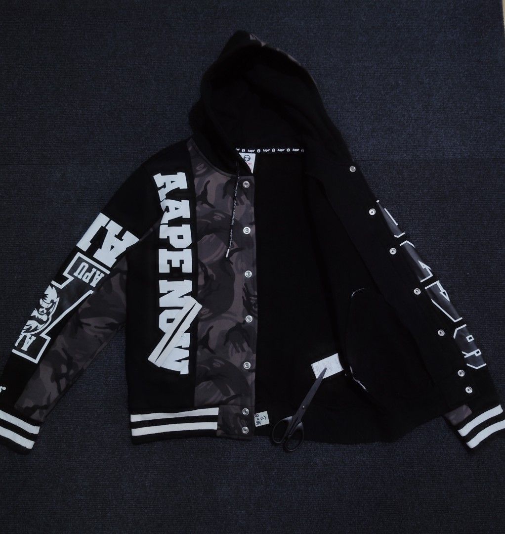 Aape Black Camo Split Hooded Varsity Jacket (Category: Coats, Jackets and Outerwear) located in Quezon City. Submitted by wgapparel (Listing ID 1466538578, Image 3). Description: 📌 available Aapé Black Camo Split Hooded Varsity Jacket. • Dimes: 20 x 24 W/L Medium on tag • Conditions: Brandnew condi 10/10 • Color Rate: 9.8 • Complete tags • Authentic 💯 • Issue: None, Bago bago pa. Susuotin mo nlng 🔖 2490 Location Quezon City Shipping via Lalamo