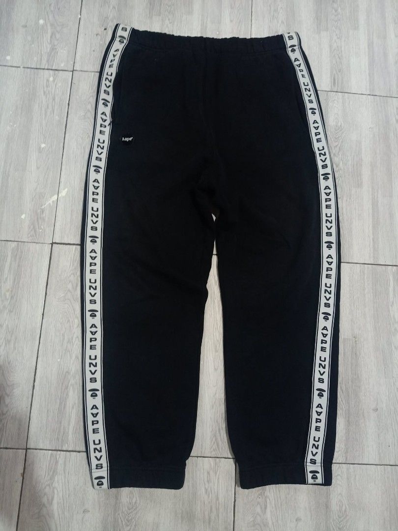 Aape UNVS Jogger Pants (Category: Joggers) located in Manila. Submitted by thriftyasher.2601. (Listing ID 1466471914, Image 1). Description: Missing Drawstring.