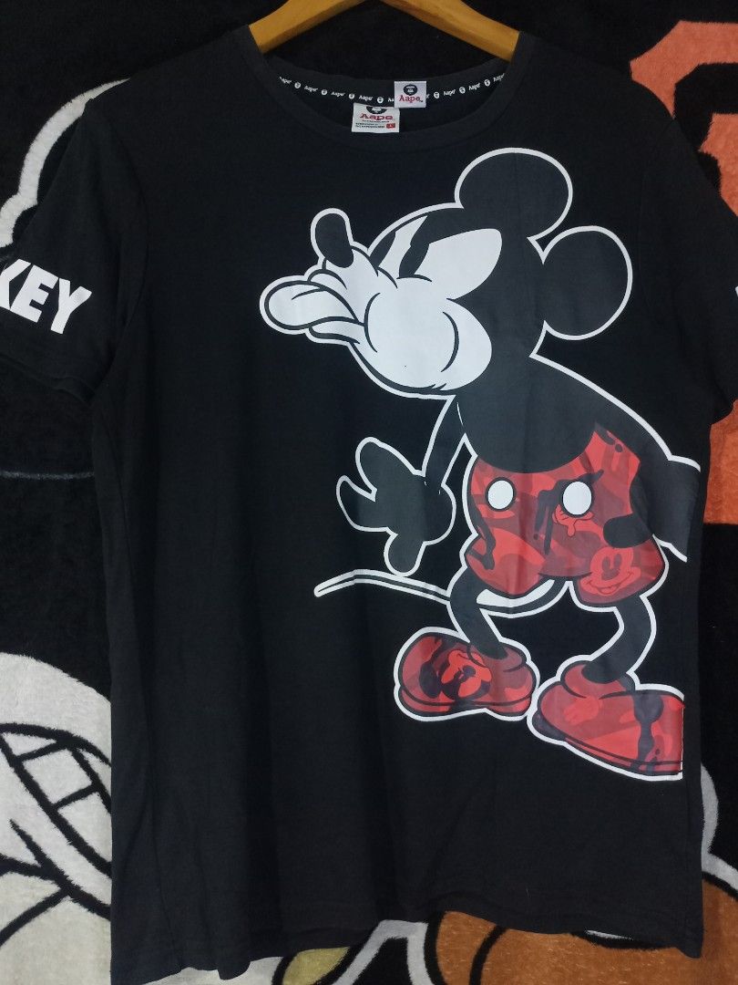 Aape x Mickey Mouse Black Tee (Category: Tshirts & Polo Shirts ) located in Castilla. Submitted by stignapamorma (Listing ID 1466481450, Image 1). Description: Size - 18.5x25.5 Condition - Excellent Color Rate - 9/10 Issue - None Price - 650+SF.