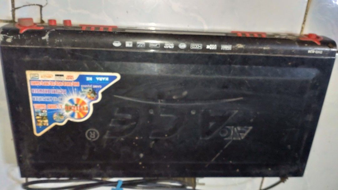 A.C.E MIDI-8558R DVD Karaoke Player (Category: Blu-Ray & Media Players) located in Valenzuela. Submitted by diane.35 (Listing ID 1466424880, Image 2). Description: - Brand/Model: A.C.E MIDI-8558R DVD Player & Karaoke Machine - Color: Black body with eye-catching red buttons and volume knobs - Entertainment Features: Dual microphone inputs for duets, USB port, and built-in FM radio - Format Support: Plays MPEG4, HDCD, MP3, DVD, and JPEG - Conditio