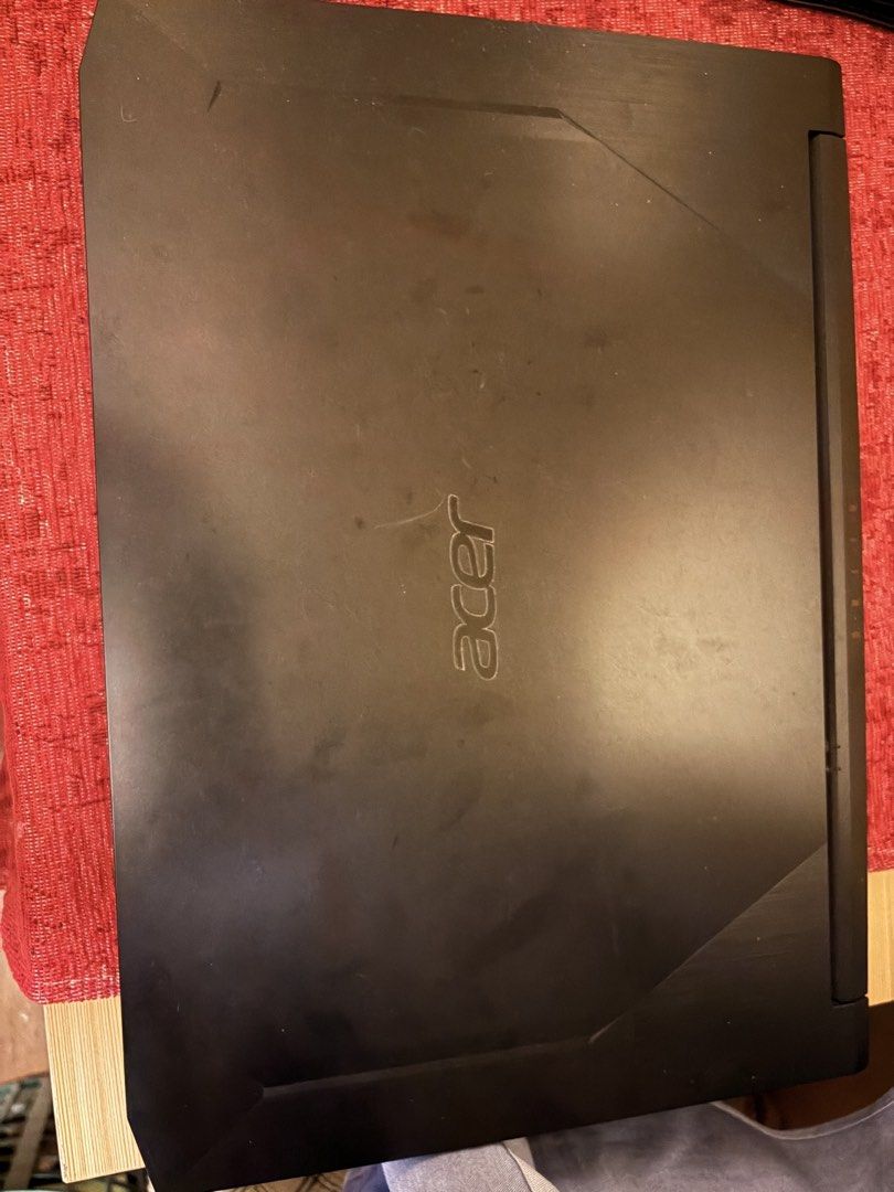 Acer Nitro 5 Gaming Laptop (Category: Laptops & Notebooks) located in Pasig City. Submitted by charlsmcdizz (Listing ID 1466358103, Image 3). Description: Acer Nitro 5 gaming laptop running Windows. Intel i5-10300H processor, NVIDIA GeForce RTX 2060 graphics card, 8GB RAM, and 1.38TB total storage. 144Hz Full HD screen. Backlit keyboard with numpad. Ports include HDMI and Ethernet. Shows dust and minor smudges on the chassis and screen, overall n