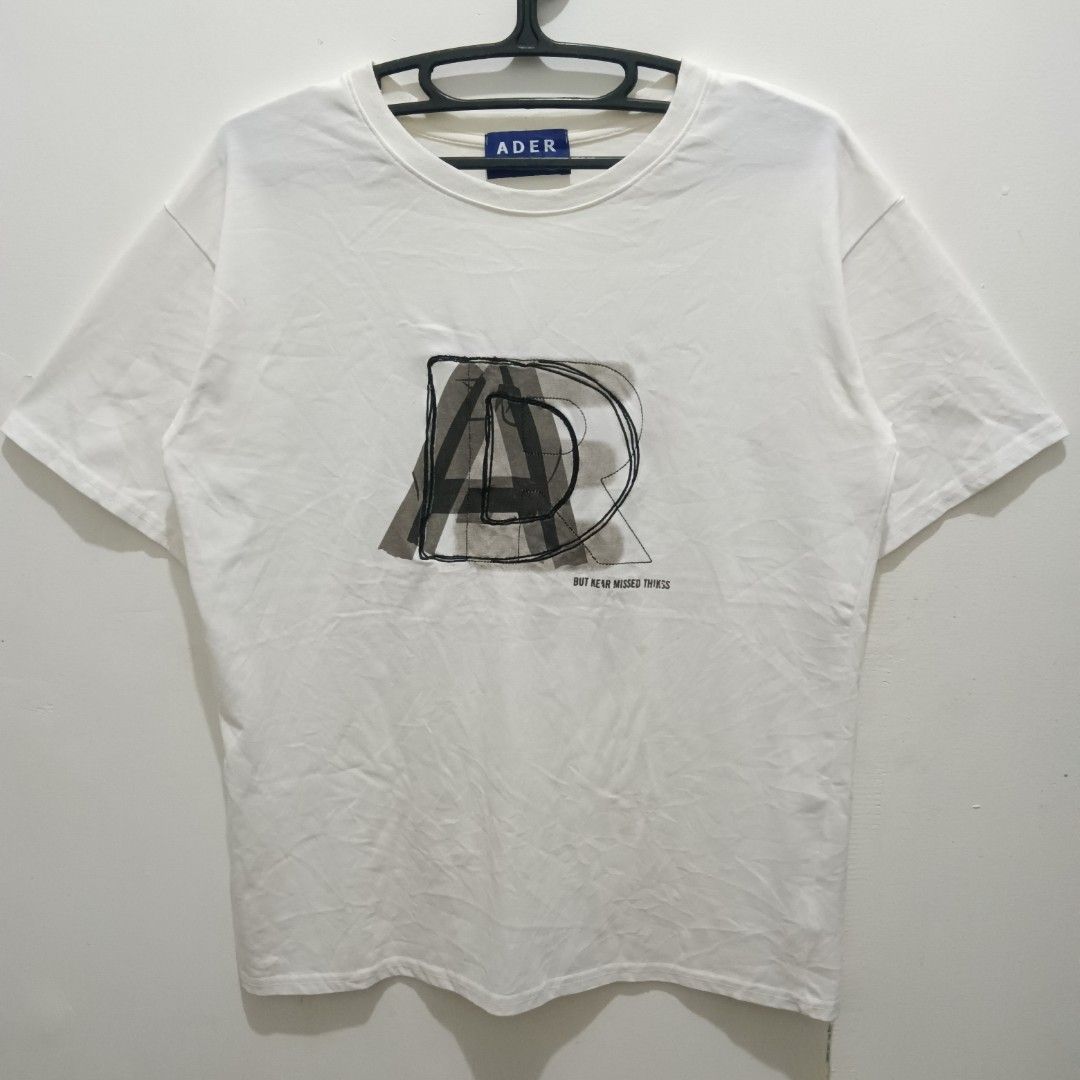 ADER ERROR Layered Logo Shirt (Category: Shirts) located in Caloocan City. Submitted by jaychingsss (Listing ID 1466463428, Image 1). Description: Ader Error Layered Logo - 120 20x26 Cut wash tag NEED WASH.