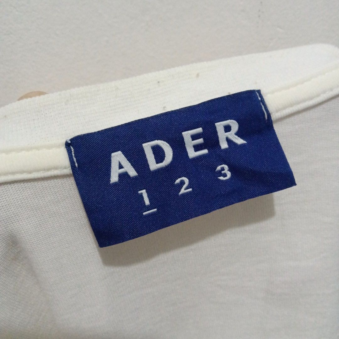ADER ERROR Layered Logo Shirt (Category: Shirts) located in Caloocan City. Submitted by jaychingsss (Listing ID 1466463428, Image 2). Description: Ader Error Layered Logo - 120 20x26 Cut wash tag NEED WASH.