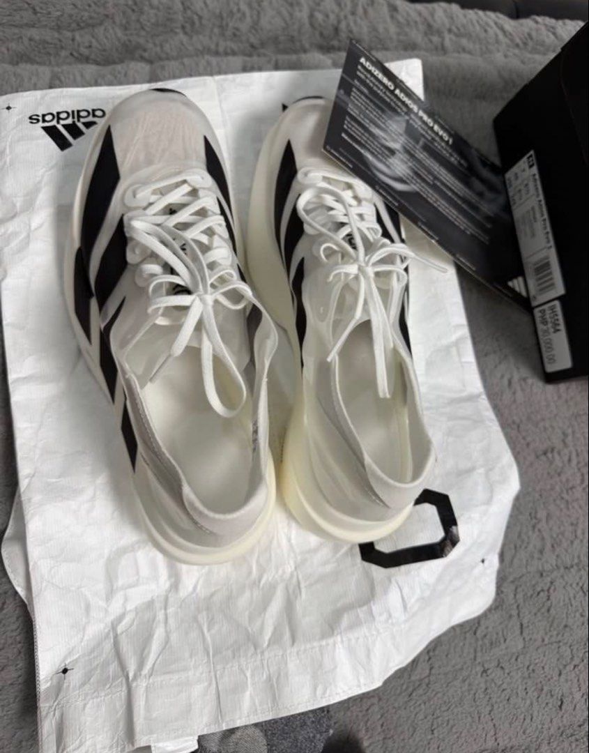 Adidas (Category: Sneakers) located in Bautista. Submitted by mariazoyacloset (Listing ID 1466337035, Image 3). Description: Adidas Adios Pro Evo 1 Size 7US/ or Size 8 women. Too many shoes. Baka mas need niyo ito for Marathon. Bought in Adidas Online. Can provide purchase of receipt..
