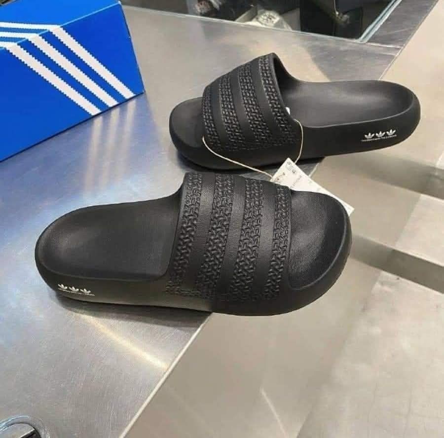 Adidas Ayoon Slides - Black (Category: Slippers and slides) located in Rizal. Submitted by hiraya16 (Listing ID 1466563128, Image 2). Description: Php 2,600 ❎ Us6 23.5 Available Onhand ready to ship. DM ✉️ One of my favorite slide, super soft when worn..Perfect for long walks. Lightweigt. J&T - Lalamove - LBC.
