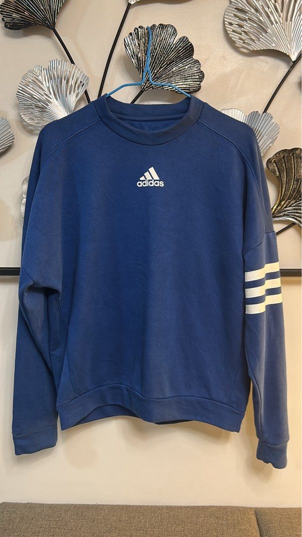 Adidas Blue Sweatshirt with Large Back Logo (Category: Coats, Jackets and Outerwear) located in Manila. Submitted by kennethlav05128 (Listing ID 1466465071, Image 1). Description: Dimes 21X24.5 Negotiable .