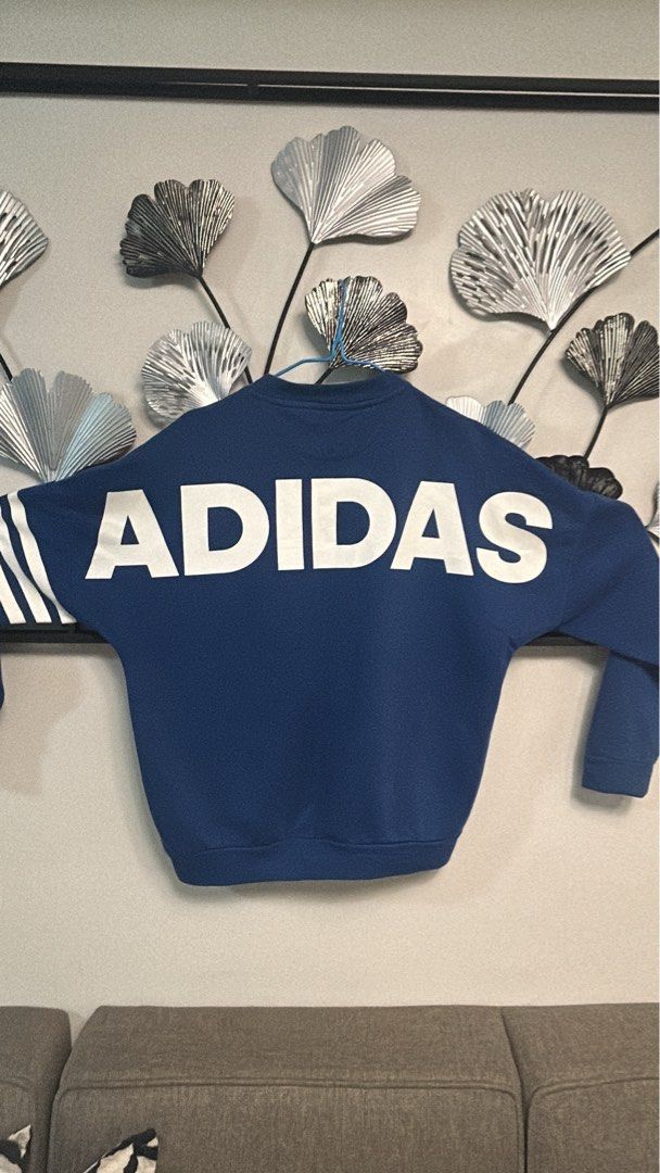 Adidas Blue Sweatshirt with Large Back Logo (Category: Coats, Jackets and Outerwear) located in Manila. Submitted by kennethlav05128 (Listing ID 1466465071, Image 2). Description: Dimes 21X24.5 Negotiable .