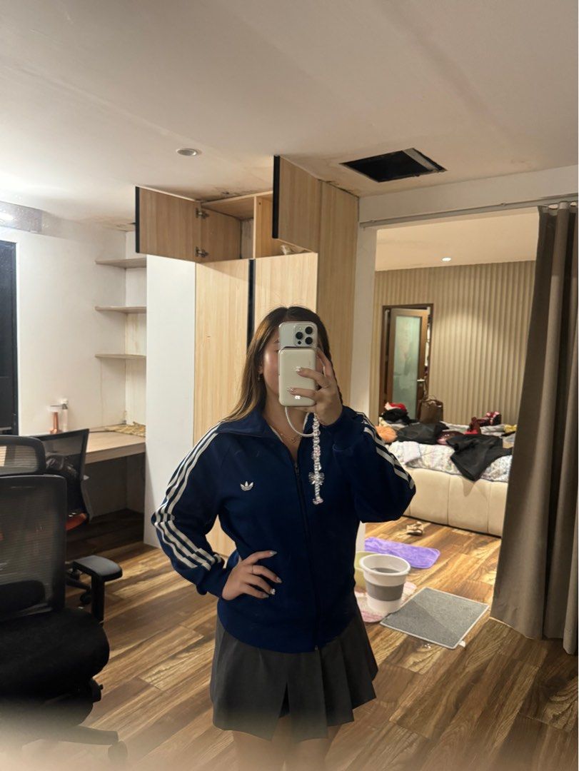 Adidas Blue Track Jacket with White Stripes (Category: Coats, Jackets and Outerwear) located in Manila. Submitted by cjy041 (Listing ID 1466506730, Image 1). Description: -thrifted from a bazaar. Never got to use it - price is negotiable. No low ballers - location: Sta. Cruz, Manila - Thrifted Authentic vintage Adidas track jacket in deep blue with classic white sleeves stripes - Features zip-up front and signature embroidered trefoil logo on the