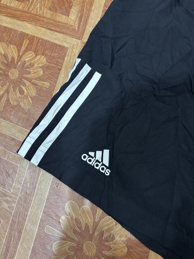 Adidas Climacool Black Shorts Size 105 (Category: Activewear) located in Manila. Submitted by noribrahim.20 (Listing ID 1466557527, Image 3). Description: - Brand: Adidas - Color: Black with classic white three stripes and logo - Size: Tag 105 - Material/Tech: Climacool fabric for breathability and sweat-wicking - Features: Elastic waistband with adjustable black drawstring - Origin: Made in Thailand - Condition: Great for workouts, running, or c