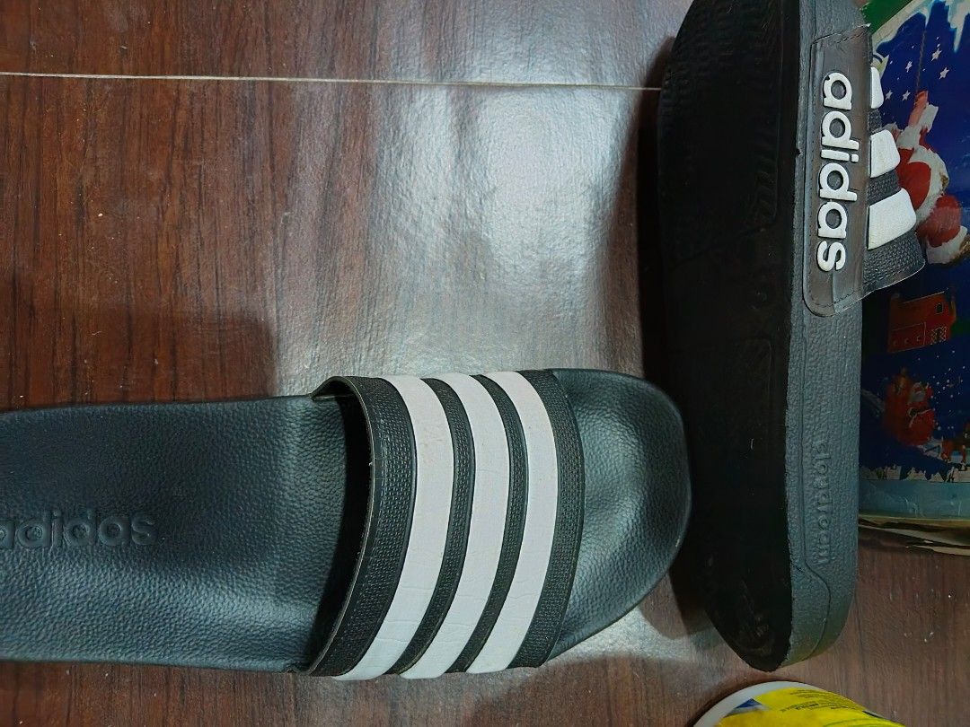 Adidas Cloudfoam Adilette Slides (Category: Slippers & Slides) located in Quezon City. Submitted by matcarla (Listing ID 1466509948, Image 2). Description: Adidas Cloudfoam Adilette Slides Size 9 US from Canada 2x used meet up: Robinsons Antipolo or add shipping fee.