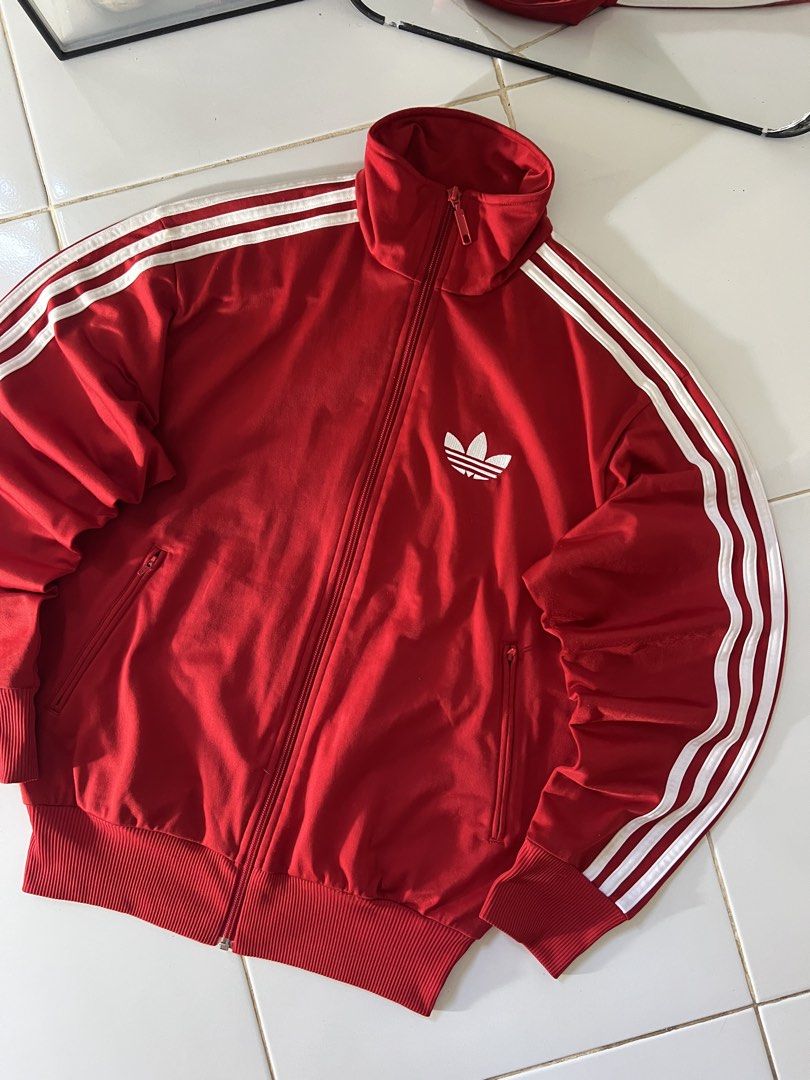 ADIDAS FIREBIRD JACKET RED🧥❤️ (Category: Coats, Jackets and Outerwear) located in Manila. Submitted by metromnlwear (Listing ID 1466337689, Image 3). Description: ADIDAS FIREBIRD JACKET RED🧥❤️ Dimes L:26” W:20” Size:Med to Large Excellent condition No issue Color rate:10/10 ₱1,500.