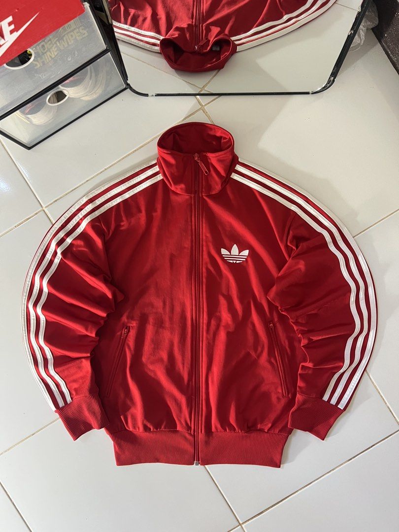 ADIDAS FIREBIRD JACKET RED🧥❤️ (Category: Coats, Jackets and Outerwear) located in Manila. Submitted by metromnlwear (Listing ID 1466337689, Image 1). Description: ADIDAS FIREBIRD JACKET RED🧥❤️ Dimes L:26” W:20” Size:Med to Large Excellent condition No issue Color rate:10/10 ₱1,500.