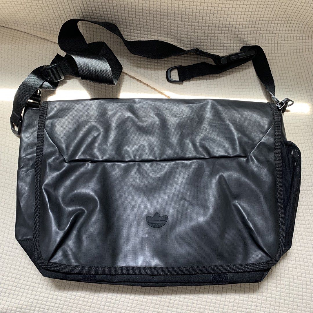 Adidas messenger bag (Category: Sling Bags) located in Surigao. Submitted by luxxbytm.ph (Listing ID 1466503454, Image 1). Description: Can hold laptop .