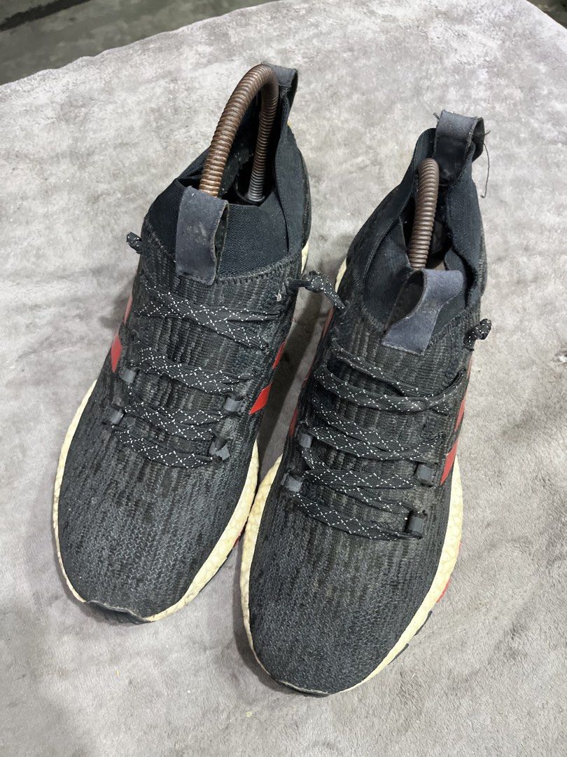 adidas Pureboost RBL | Size 41 (Category: Sneakers) located in General Trias. Submitted by zrchustle.604 (Listing ID 1466444047, Image 2). Description: the adidas Pureboost RBL (specifically the 'Black Scarlet' / 'Black Red' colorway, model code CM8309 or G26430). This is a winterized, all-terrain version of the classic Pureboost model, designed specifically for cold-weather city running. It features a splash-resistant adaptive knit upper, a prot