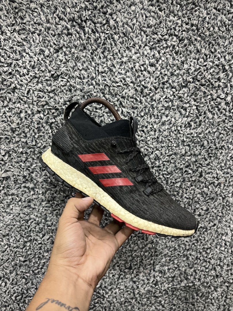 adidas Pureboost RBL | Size 41 (Category: Sneakers) located in General Trias. Submitted by zrchustle.604 (Listing ID 1466444047, Image 1). Description: the adidas Pureboost RBL (specifically the 'Black Scarlet' / 'Black Red' colorway, model code CM8309 or G26430). This is a winterized, all-terrain version of the classic Pureboost model, designed specifically for cold-weather city running. It features a splash-resistant adaptive knit upper, a prot