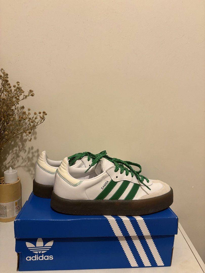 Adidas Sambae White Green Platform Sneakers (Category: Sneakers) located in Manila. Submitted by viee1777 (Listing ID 1466479931, Image 3). Description: - Brand: Adidas - Model: Sambae Platform Sneakers - Colorway: White and Green - Sole: Trendy thick translucent gum sole - Laces: Unique green and white patterned rope laces - Details: Green three stripes and heel tab with zigzag stitching, iconic gold SAMBA lettering on the side - Inclusion: Orig