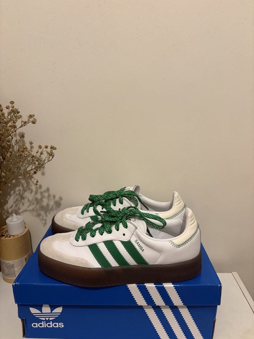 Adidas Sambae White Green Platform Sneakers (Category: Sneakers) located in Manila. Submitted by viee1777 (Listing ID 1466479931, Image 1). Description: - Brand: Adidas - Model: Sambae Platform Sneakers - Colorway: White and Green - Sole: Trendy thick translucent gum sole - Laces: Unique green and white patterned rope laces - Details: Green three stripes and heel tab with zigzag stitching, iconic gold SAMBA lettering on the side - Inclusion: Orig