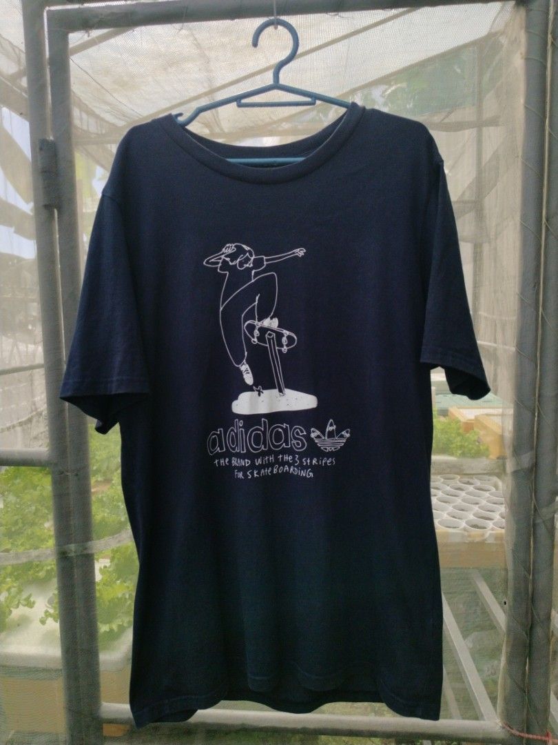 Adidas Skateboarding (Category: Tshirts & Polo Shirts ) located in Legazpi City. Submitted by genobecollectives (Listing ID 1466345775, Image 1). Description: Adidas Skateboarding 480 free ship - Color: Dark blue - Design: Hand-drawn skater graphic with 'the brand with the 3 stripes for skateboarding' text - Fit: Standard fit, crew neck, short sleeves - Material: Comfortable cotton - Production Date: 08/23 - Condition: Excellent / Ready to wear -