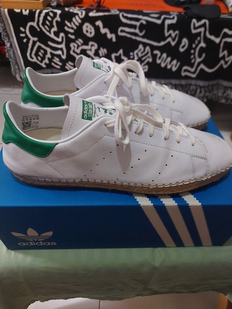 Adidas Stan Smith Espadrille White Green (Category: Sneakers) located in Manila. Submitted by rence1010141877 (Listing ID 1466407202, Image 1). Description: - Brand/Model: Adidas Stan Smith with espadrille jute midsole trimming - Colorway: Classic white leather upper with green heel tab and tongue branding - Size: US 11.5 / UK 11 / FR 46 - Condition: Clean, minimal creasing near the toe box - Inclusion: Original blue Adidas box with white stripes