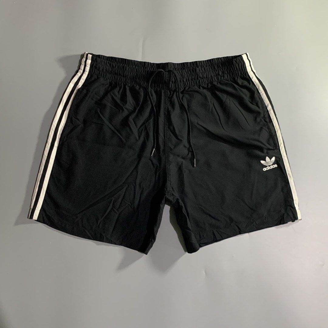 Adidas tree stripes essential short (Category: Shorts) located in Davao. Submitted by jandyfuert21303 (Listing ID 1466502051, Image 2). Description: Good as new condition No issues 32x17.4 (stretchable) 10/10.