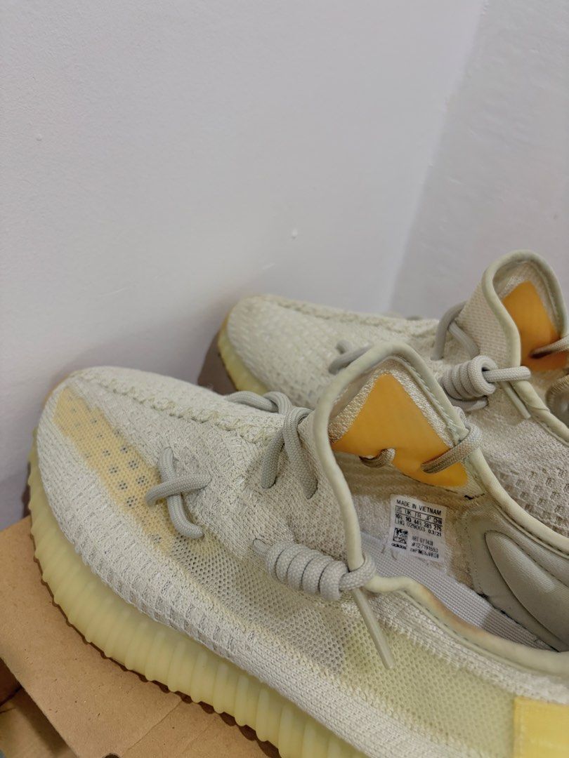 Adidas Yeezy Boost 350 V2 “Light” (Category: Sneakers) located in Mandaue City. Submitted by mochi_emm (Listing ID 1466468924, Image 2). Description: Size: US 10.5 • Color-changing upper - changes color when exposed to sunlight • With sole protector • Well taken care of • Good condition Selling Price: ₱14,000 Bought for ₱18,000.