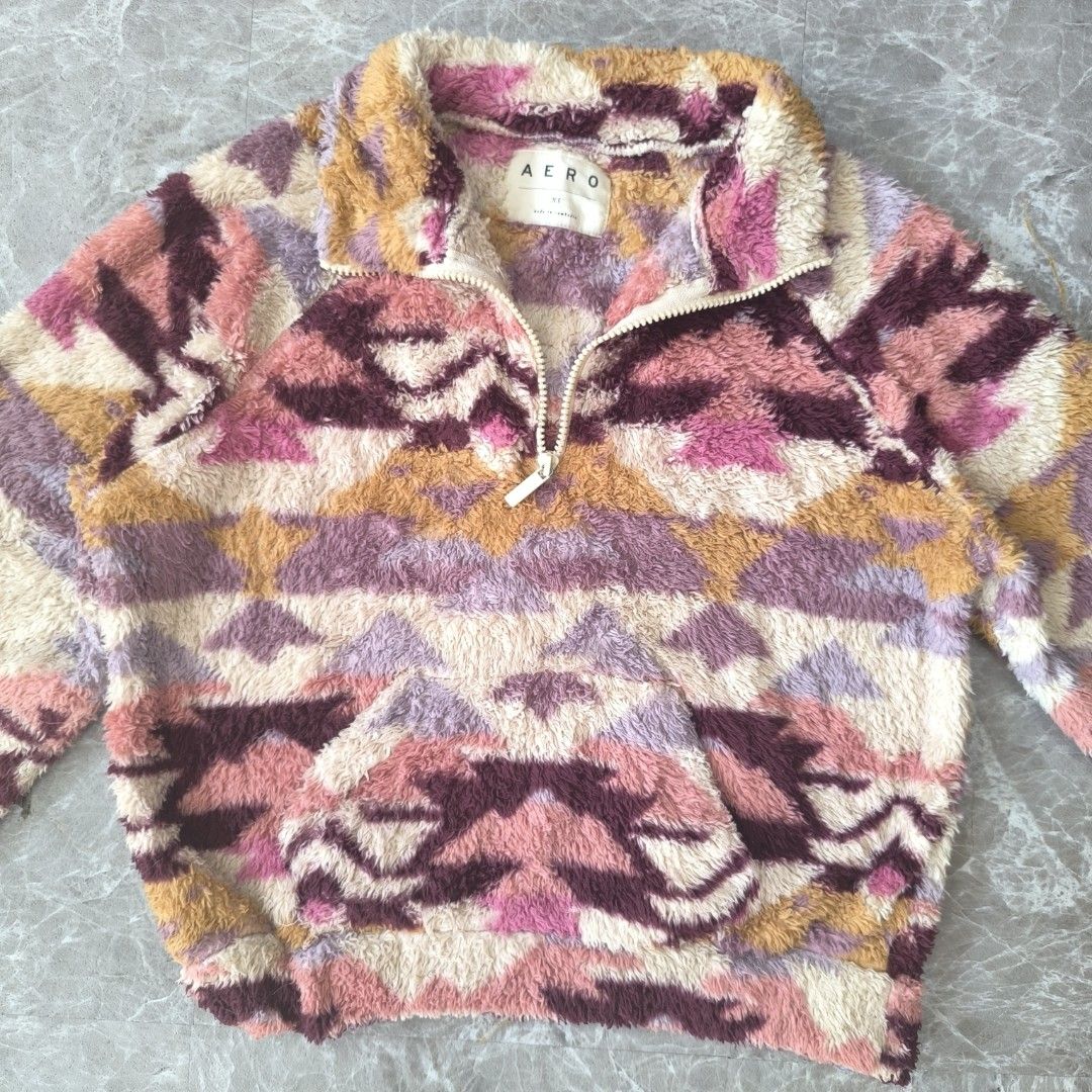 Aero Aztec Print Sherpa Quarter Zip Pullover (Category: Coats, Jackets and Outerwear) located in Tabaco. Submitted by thriftkobicolshop (Listing ID 1466388484, Image 3). Description: - Brand/Style: Fuzzy Aero sherpa pullover - Size: Extra Small on tag, can fit Small - Medium - Dimes: 19.5 stomach 21 bust 21 length - Design: Vibrant Aztec geometric pattern - Colors: Pink, purple, mustard yellow, and cream - Features: Quarter-zip front collar, long