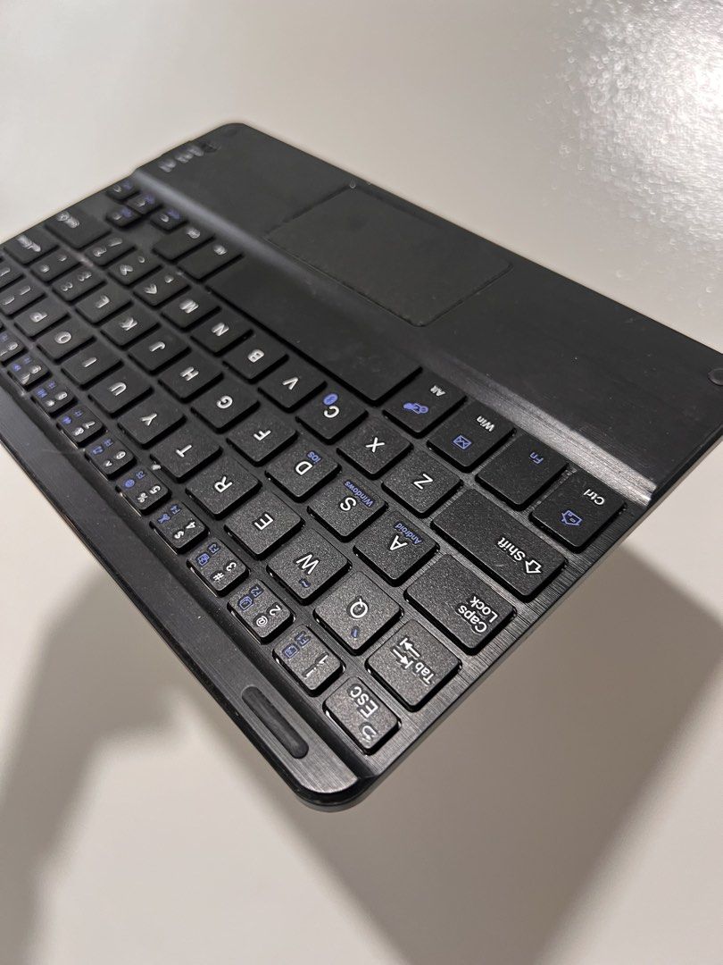 Affordable slim, black wireless Bluetooth keyboard with a built-in touchpad 😍👌🏻 (Category: Computer Keyboard) located in Malolos. Submitted by afford.japan (Listing ID 1466443612, Image 2). Description: Affordable slim, black wireless Bluetooth keyboard with a built-in touchpad 😍👌🏻.