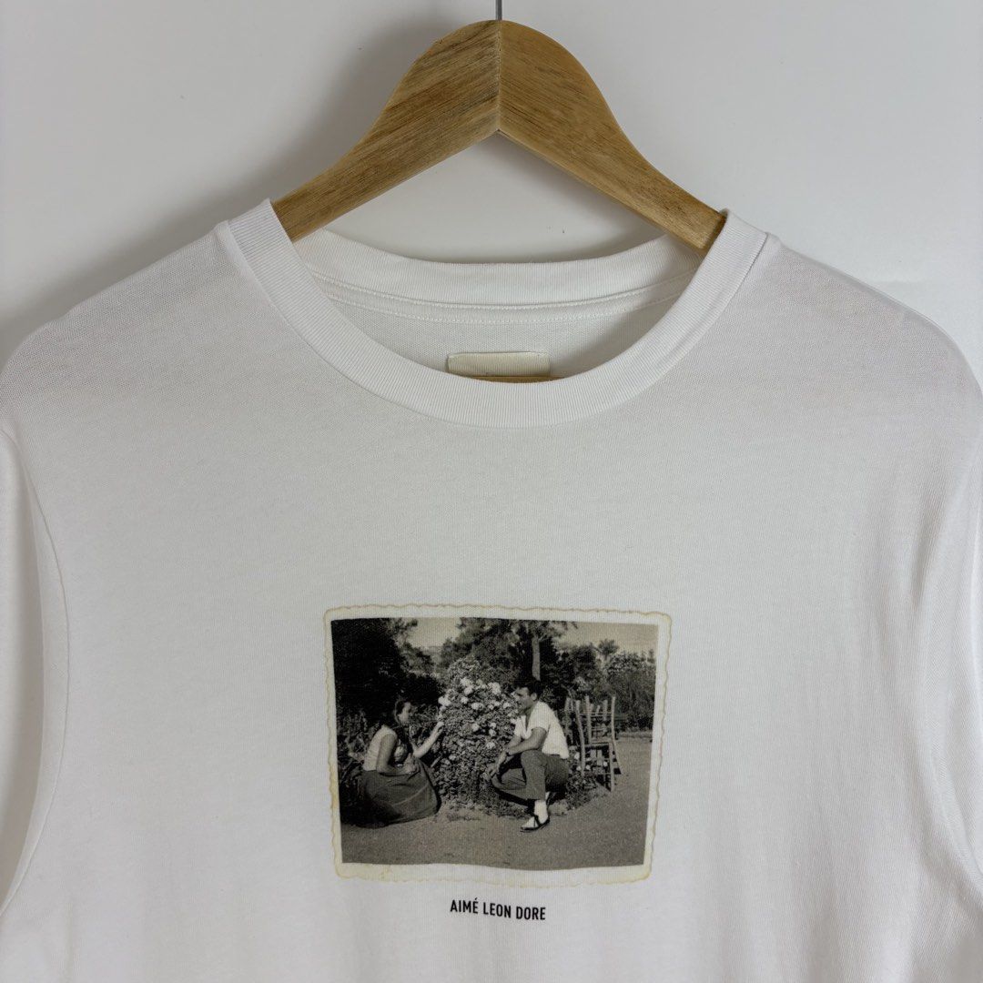Aimé Leon Dore SS23 Spring Photo Tee (Category: Tshirts & Polo Shirts ) located in Calamba. Submitted by 2muchclothes_ (Listing ID 1466423337, Image 3). Description: Measurements Size: Medium Width: 20.5 Length: 29 Shoulder: 18 Sleeve: 9.25.