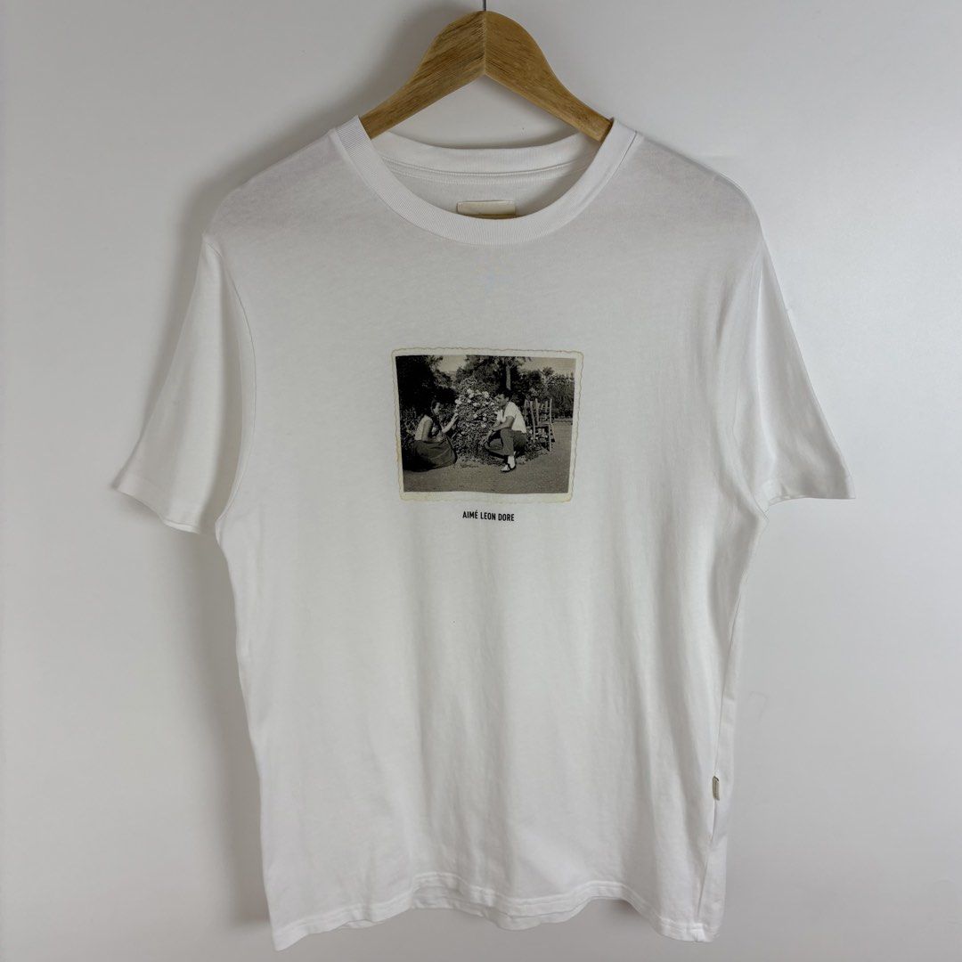 Aimé Leon Dore SS23 Spring Photo Tee (Category: Tshirts & Polo Shirts ) located in Calamba. Submitted by 2muchclothes_ (Listing ID 1466423337, Image 2). Description: Measurements Size: Medium Width: 20.5 Length: 29 Shoulder: 18 Sleeve: 9.25.