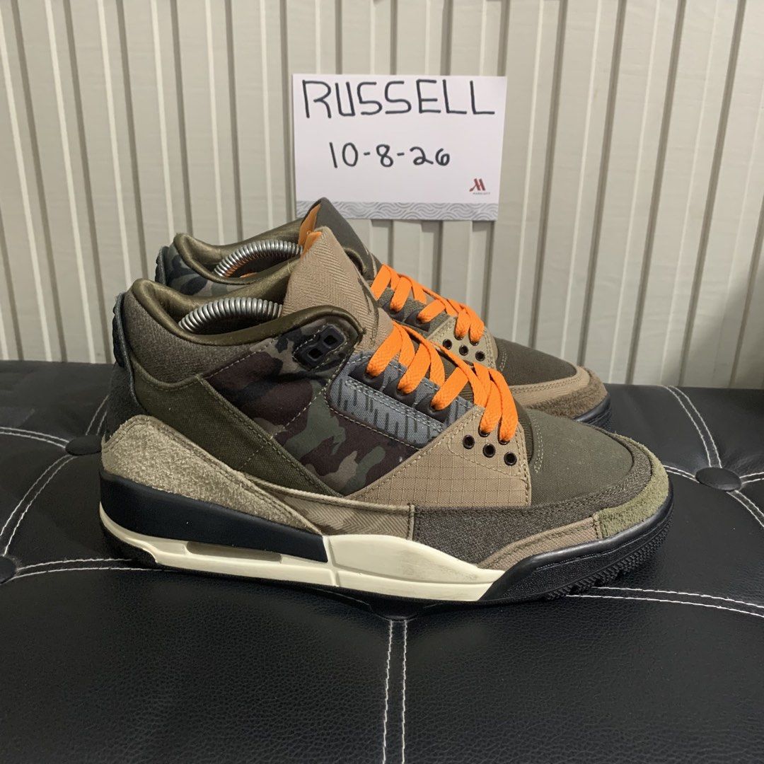 Air Jordan 3 Retro Patchwork Camo (Category: Sneakers) located in Taguig. Submitted by russell242 (Listing ID 1466539996, Image 2). Description: - Model: Air Jordan 3 Retro with rare camouflage panels - Materials: Premium canvas and suede upper with detailed contrast stitching - Accents: Vibrant orange laces and matching inner lining - Branding: Embroidered Jumpman logo on tongue and heel - Sole: Black/off-white midsole with visible Air unit and 