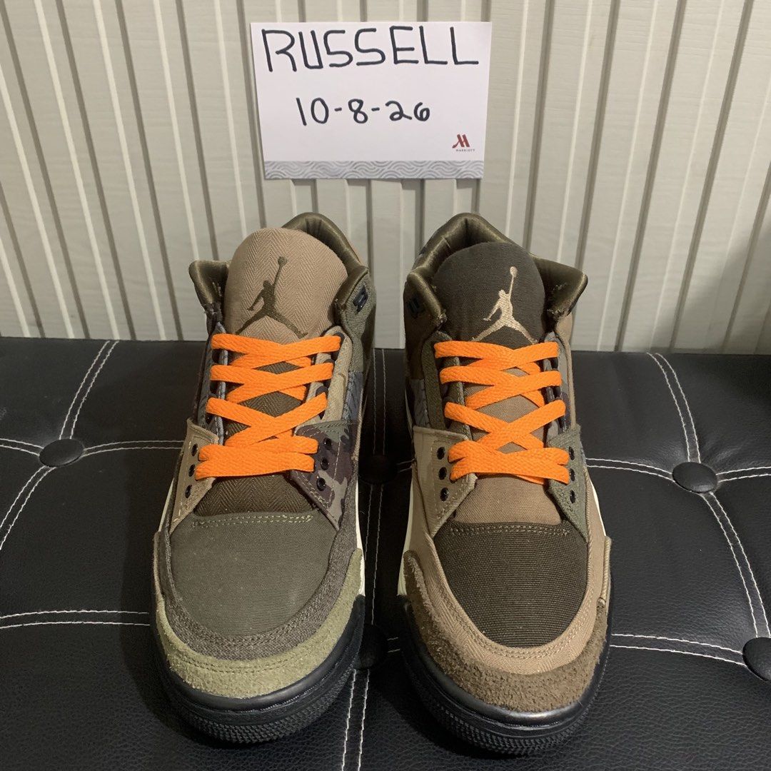 Air Jordan 3 Retro Patchwork Camo (Category: Sneakers) located in Taguig. Submitted by russell242 (Listing ID 1466539996, Image 3). Description: - Model: Air Jordan 3 Retro with rare camouflage panels - Materials: Premium canvas and suede upper with detailed contrast stitching - Accents: Vibrant orange laces and matching inner lining - Branding: Embroidered Jumpman logo on tongue and heel - Sole: Black/off-white midsole with visible Air unit and 