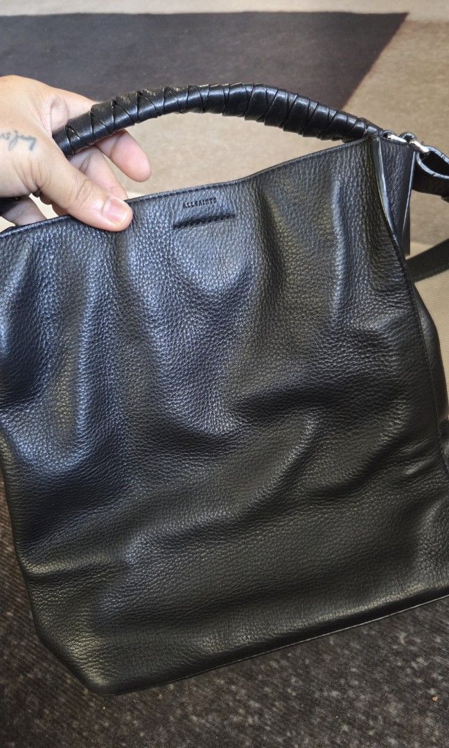 All saints leather bucket bag FINAL PRICE (Category: Cross-body Bags) located in Pagudpud. Submitted by jmpascual044757 (Listing ID 1466493836, Image 2). Description: 100% guaranteed original!!! bought by my mom in the us preloved not ukay made of genuine leather still in great condition like new! no rubs no holes no maggled leather and rubber linings are intact pass po sa barat pass sa maarte no free sf initially posted for 3000, reduced to 1800