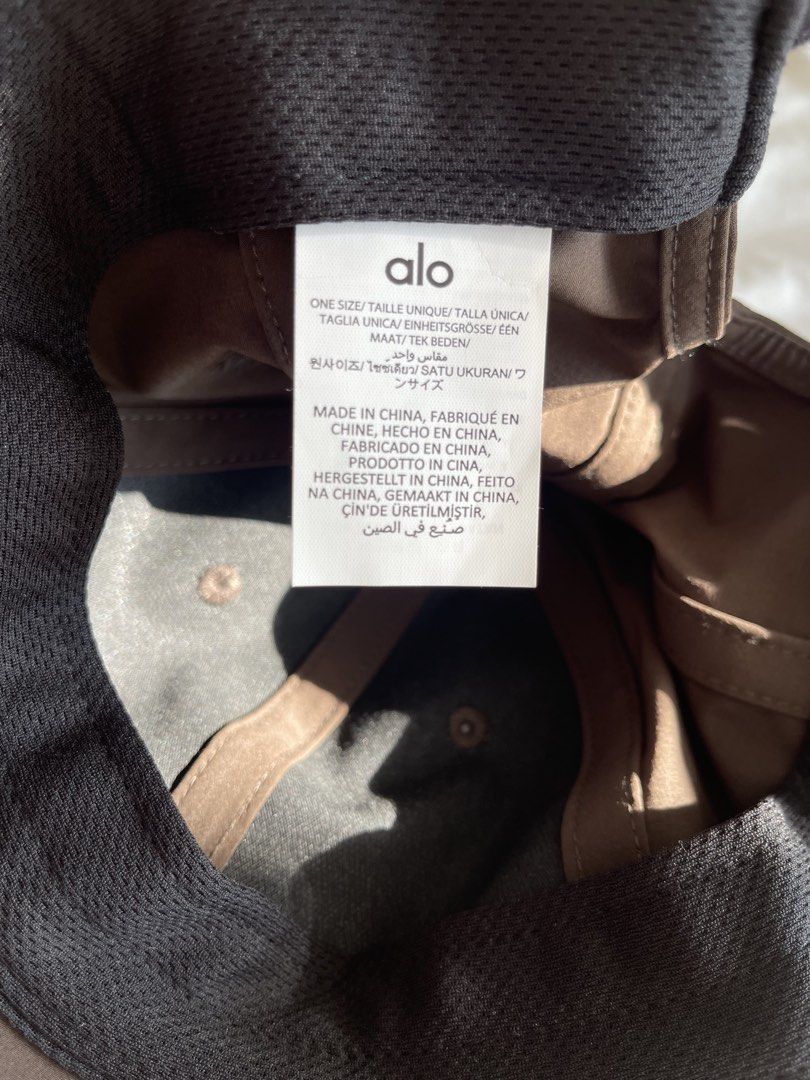 Alo Yoga Performance Off-Duty Cap Espresso (Category: Caps & Hats) located in Quezon City. Submitted by basicsandessentials (Listing ID 1466337686, Image 2). Description: - Brand: Alo Yoga - Style: Performance Off-Duty Cap - Colorway: Espresso (Rich brown) - Details: Matte rubberized Alo logo on front - Fit: Adjustable velcro strap closure (One size fits most) - Condition: Clean inner sweatband and crisp exterior fabric - Ideal for: Gym, errands,