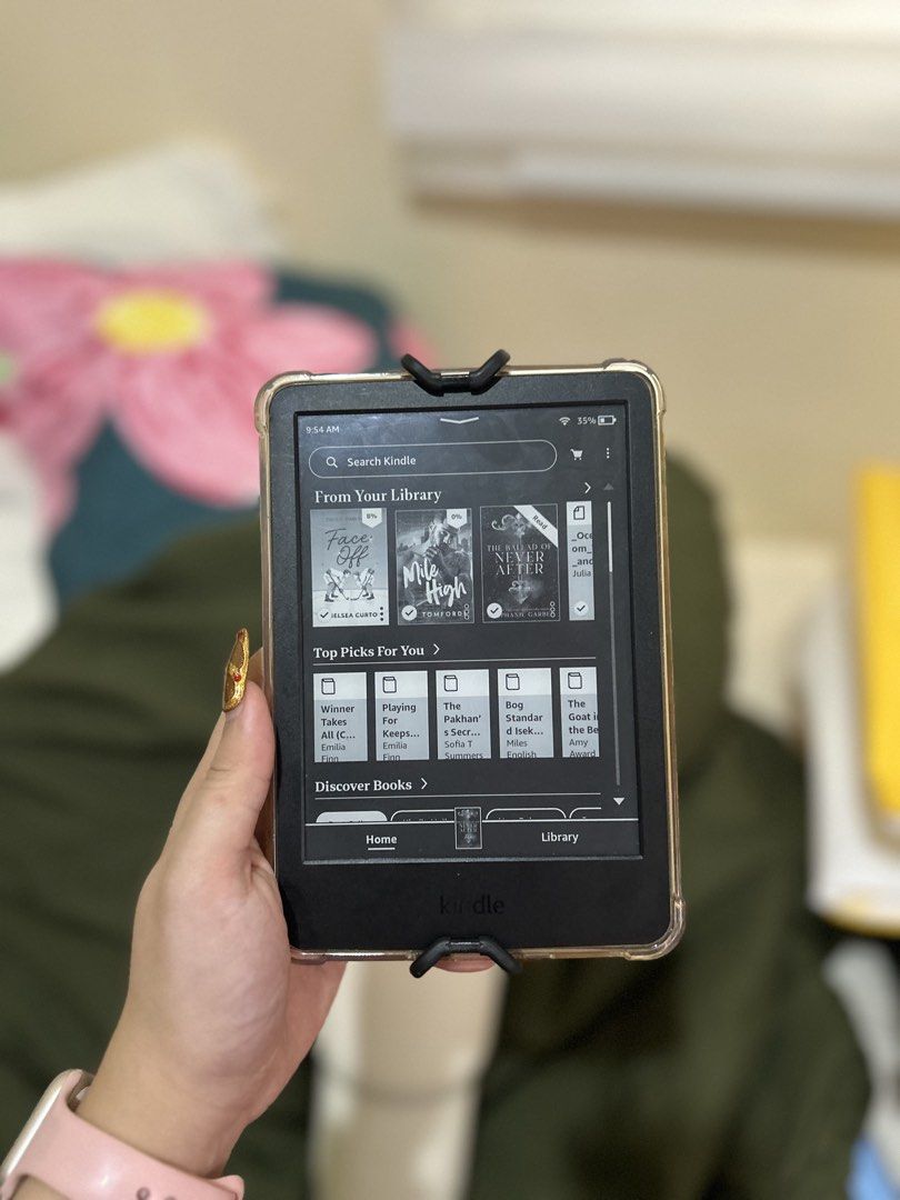 Amazon Kindle 2024 (No Ads) Gen 11 (FREE SHIPPING) (Category: E-Readers) located in Mataasnakahoy. Submitted by monoky (Listing ID 1466352464, Image 3). Description: - Brand/Model: Amazon Kindle 2024 e-reader - Condition: Layered condition 7, well-maintained and fully functional - Display: Glare-free screen that reads like real paper, even in bright sunlight - Accessories included: Clear protective case, floral pattern elastic hand strap, and ado