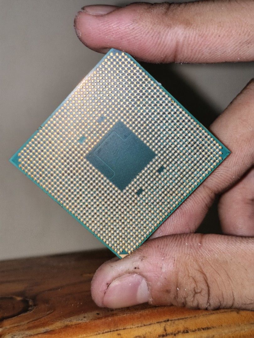 AMD Ryzen 3 3200G Processor (Category: Computer Parts) located in Taguig. Submitted by swiftmountain.9f7236 (Listing ID 1466507213, Image 2). Description: - Model: AMD Ryzen 3 3200G Processor - Specs: 4 cores, 4 threads, with integrated Radeon Vega 8 graphics - Condition: Pulled from an old set up. UNTESTED - Physical: Pins are straight and clean; minor dried thermal paste residue on IHS edges Won't test, no board. Selling as is.