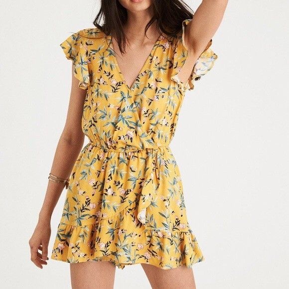 American eagle rompers (Category: Rompers) located in Manila. Submitted by zenwind_3cdc42 (Listing ID 1466349486, Image 2). Description: American Eagle Outfitters yellow floral faux-wrap ruffle romper skort • Authentic Asnew Condition • 10/10 Color rate • Care tags inside complete • ₱500+Shipping • Shipping via j&t // door to door // flash • Payment thru Gcash // Cash.