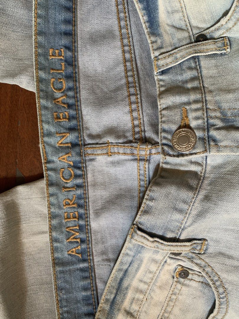 American Eagle Skinny Light Wash Jeans (Category: Jeans) located in Pasig City. Submitted by tan_flipping (Listing ID 1466560647, Image 3). Description: - Brand: American Eagle - Fit: Skinny - Color/Wash: Light wash with subtle fading and distressing - Details: Classic five-pocket setup, button closure, zipped fly, and leather brand patch on the back waistband - Condition: Well-maintained and ready to wear.