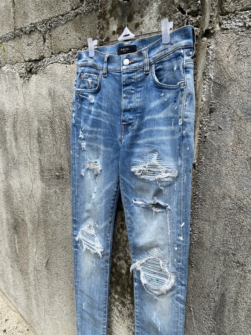Amiri Distressed Denim pants (Category: Jeans) located in Manila. Submitted by why_notph (Listing ID 1466483313, Image 2). Description: - Classic blue wash denim with stylish contrast orange stitching - Authentic Cobrax Original engraved metal button hardware - Standard weight twill weave fabric for everyday comfort - Sturdy construction featuring reinforced seams along the waistband - Dimensions: W : 31-32 Rise : 13 Leg : 8 Leg opening : 5.5.