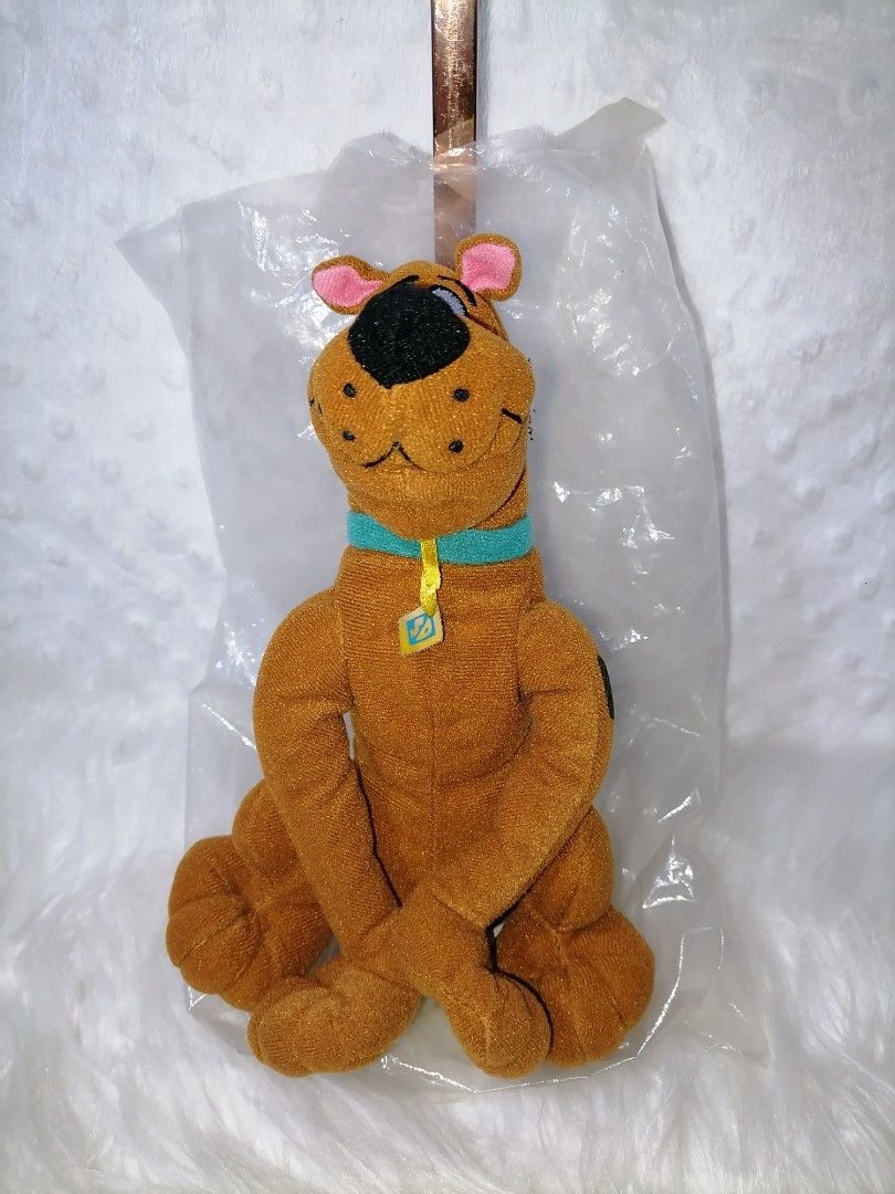 Applause Scooby-Doo Poseable Plus Toy (Category: Plushies & Soft Toys) located in Butuan. Submitted by az-branded.items (Listing ID 1466337156, Image 1). Description: Plus toy from 1999 New with plastic binuksan ko lang for picture. Authentic item From Japan.