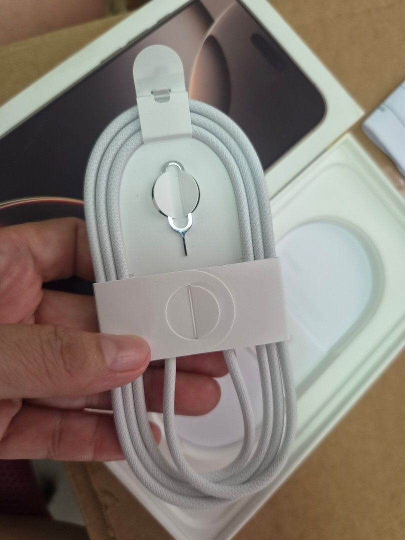 Apple Original Type C Cable (Category: Chargers & Cables) located in Caloocan City. Submitted by mary_rose_04 (Listing ID 1466383274, Image 2). Description: - Authentic Apple Type-C charging and data cable - Durable braided white finish - Comes with a built-in slot ho and SIM ejector pin - Excellent, brand-new-like condition.
